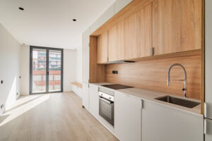 contemporary-minimal-kitchen-living-room-with-balcony-empty-refurbished-apartment-wooden-furn