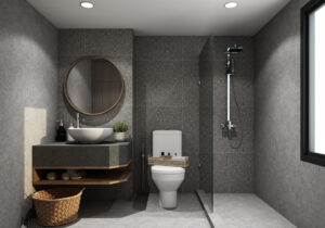 hotel-bathroom-toilet-with-dark-gray-stone-tile-walls-concrete-floor-shower-near-window-sink-wooden-countertop-with-round-mirror-with-wooden-decoration-3d-rendering